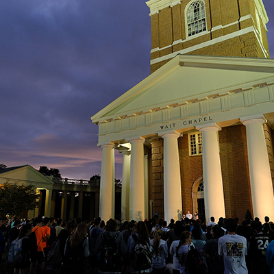 A gathering in front of Wait Chapel