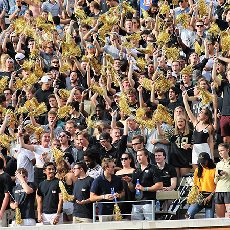 Demon Deacons Football vs Louisville - WFU Students cheer on the Demon Decons with gold pompoms