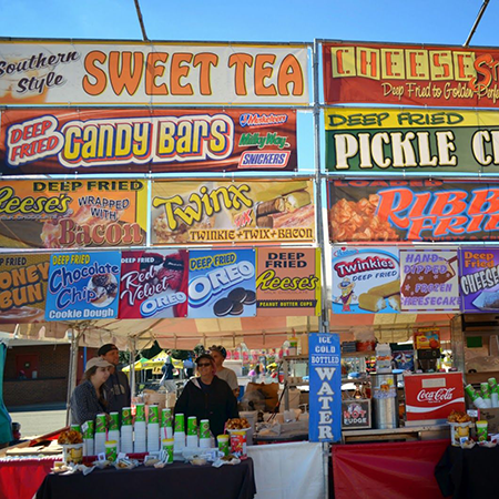 Colorful signs advertise the wide variety of deep fried foods at the Carolina Classic Fair